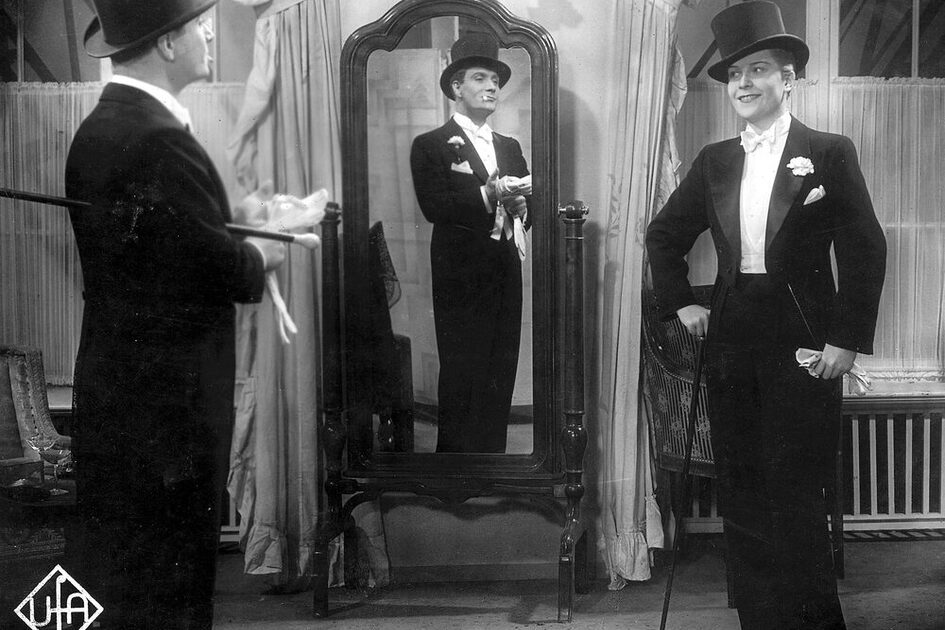 Ein Mann und eine Frau mit Zylinder